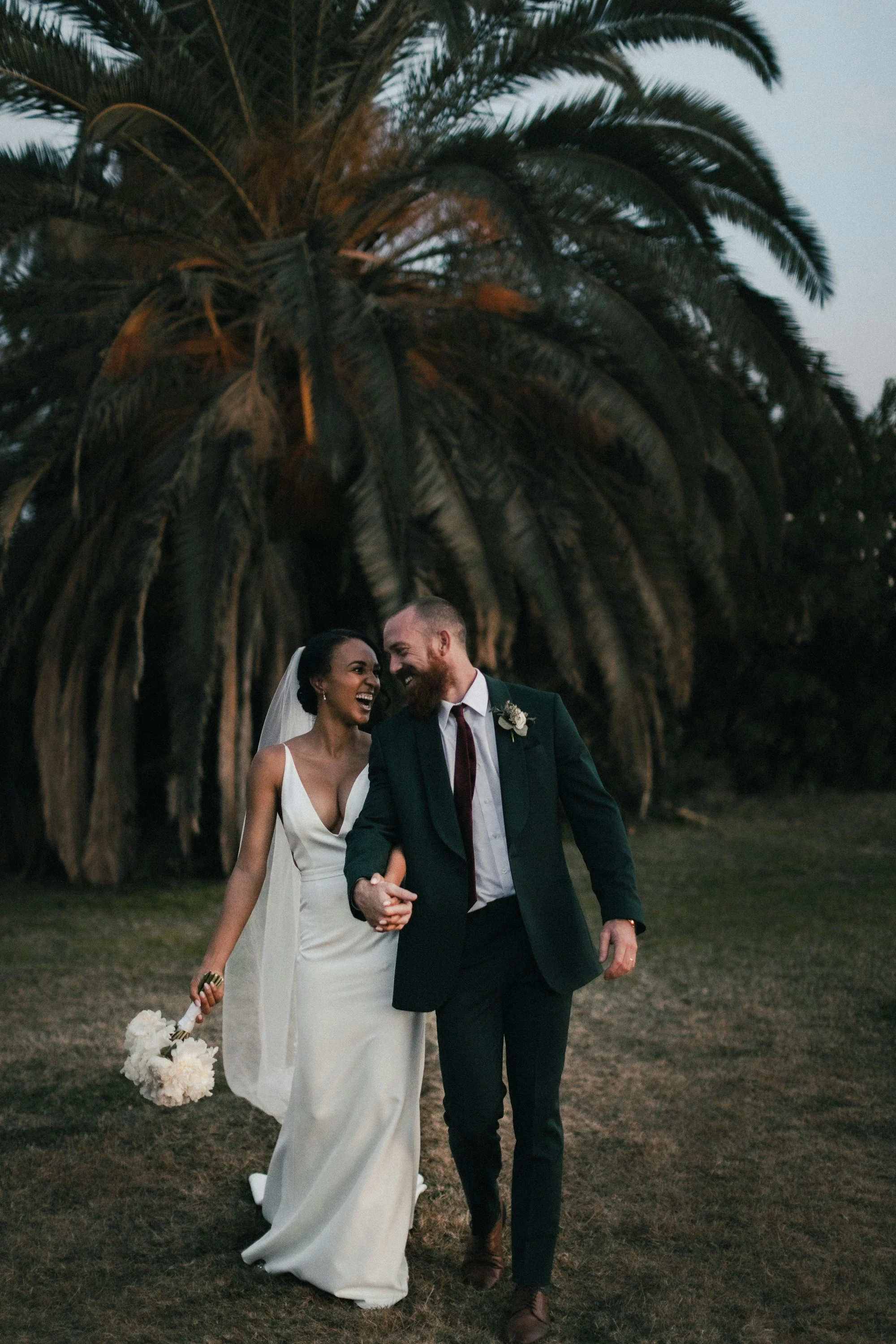 The couple walking at dusk