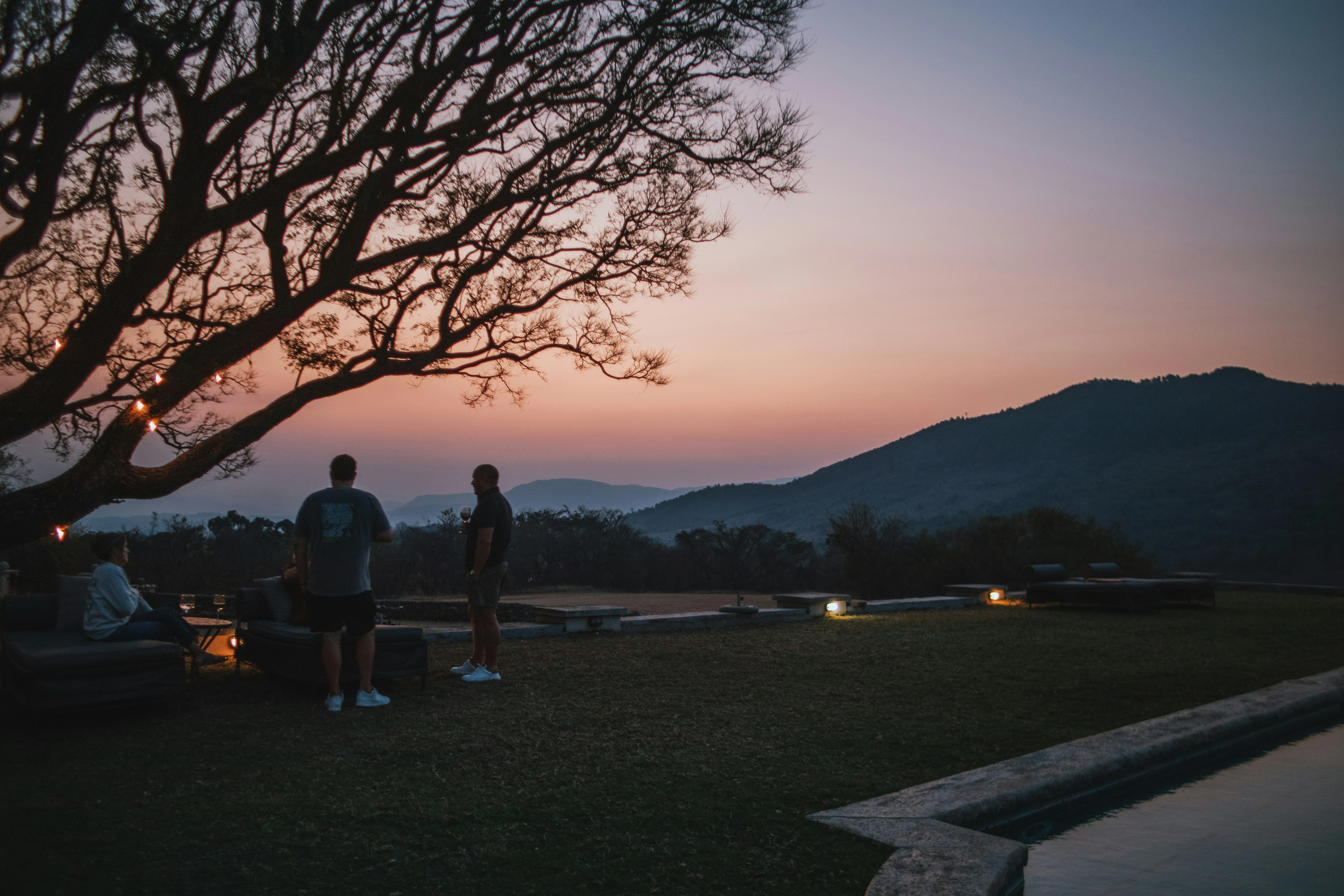 Sundowners on the lawn as the light goes